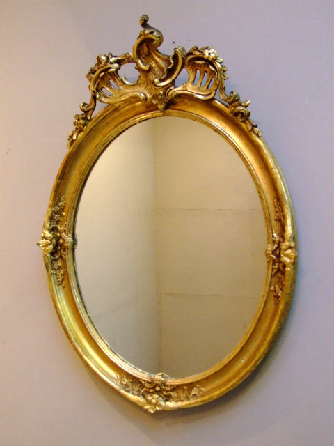 antique french crested oval mirror